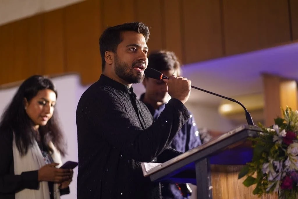 Shohag Fardin Oron speaking at a podium